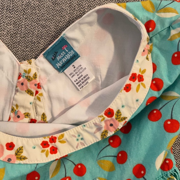 Miss. Marmalade dress with cherry & floral, back detail and pockets, size 2. - Picture 2 of 3